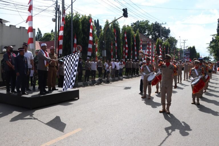 Polres Tanah Laut Bersama Forkopimda Gelar Kirab Merah Putih