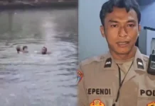 Aksi Menegangkan Aipda Ependi Anggota Polsek Koja Selamatkan Anak Hampir Tenggelam Terbawa Arus Kali